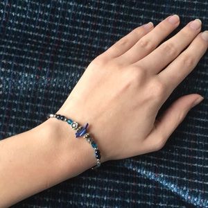 Simple bird charm bracelet